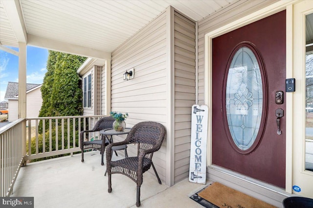 doorway to property featuring a porch