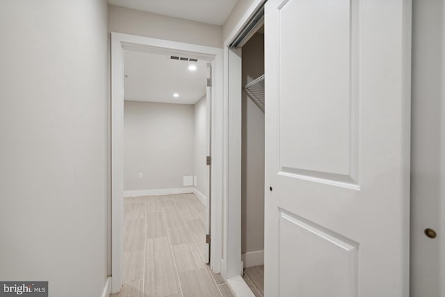 hallway featuring light hardwood / wood-style floors