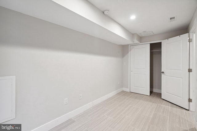 unfurnished bedroom with a closet