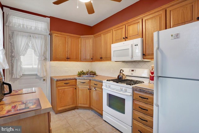 kitchen with ceiling fan, decorative backsplash, white appliances, and light tile patterned floors