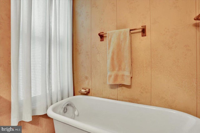 bathroom with a bathing tub