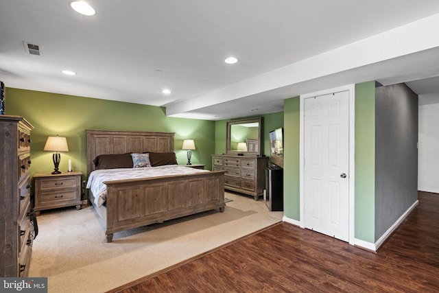 bedroom with wood-type flooring