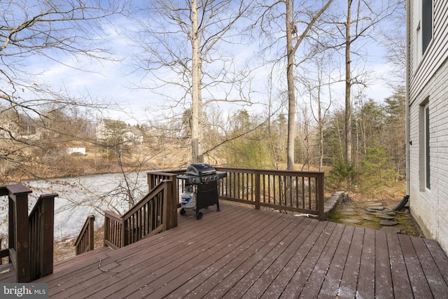 deck featuring a grill