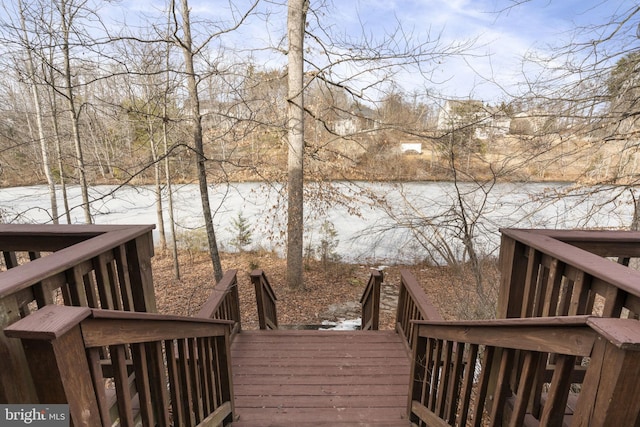 deck featuring a water view