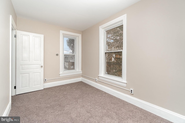 view of carpeted spare room