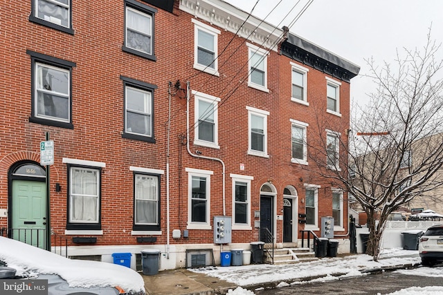 view of snow covered property