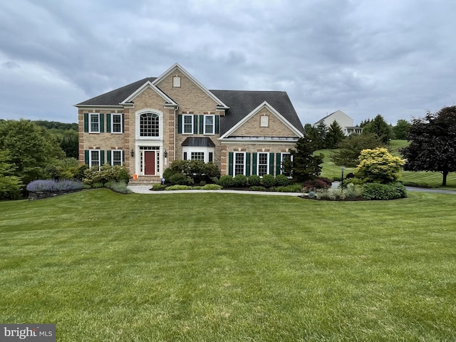 view of front of property with a front lawn