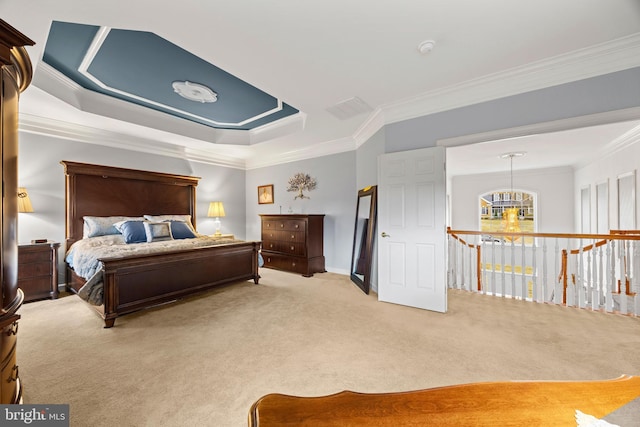 carpeted bedroom with ornamental molding and an inviting chandelier