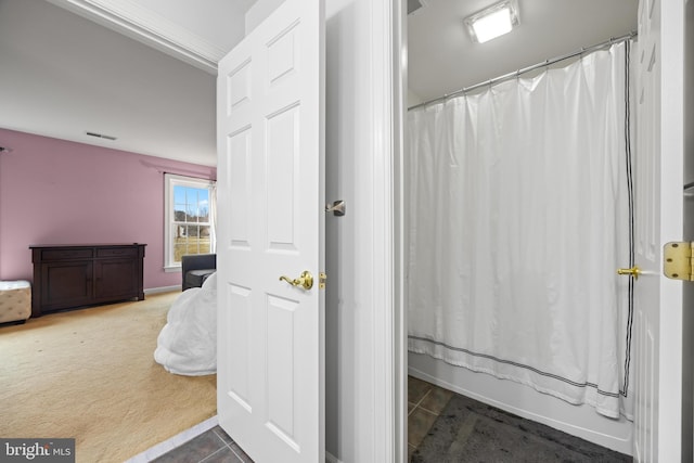 bathroom with visible vents and tile patterned floors