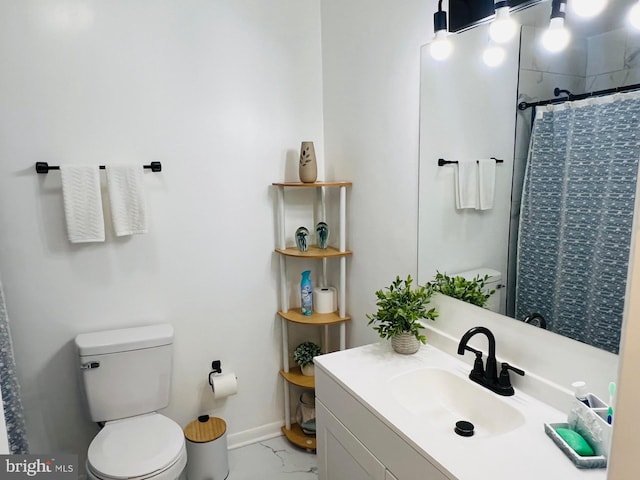 full bathroom featuring marble finish floor, curtained shower, toilet, vanity, and baseboards