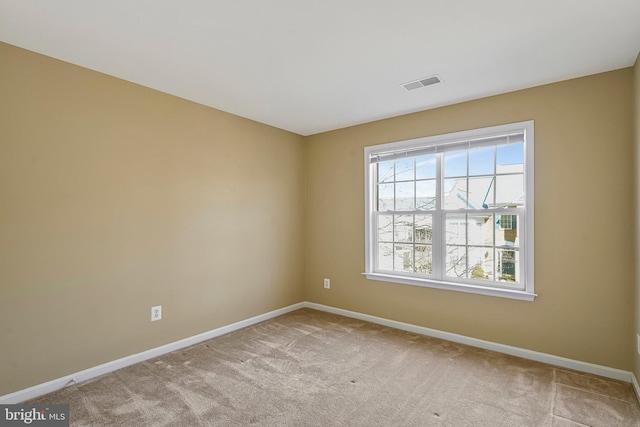 view of carpeted spare room