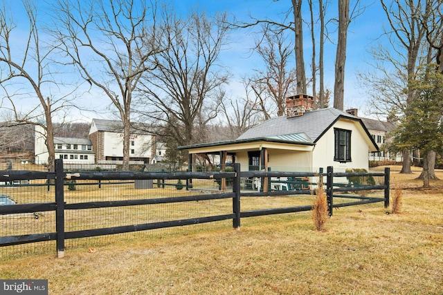 exterior space featuring a lawn