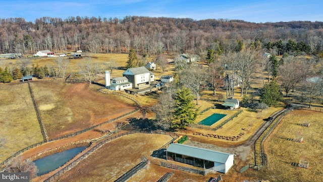 birds eye view of property featuring a rural view