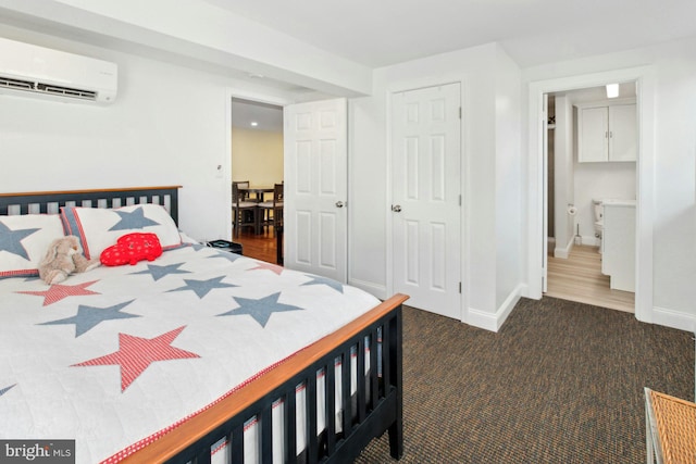 carpeted bedroom featuring an AC wall unit