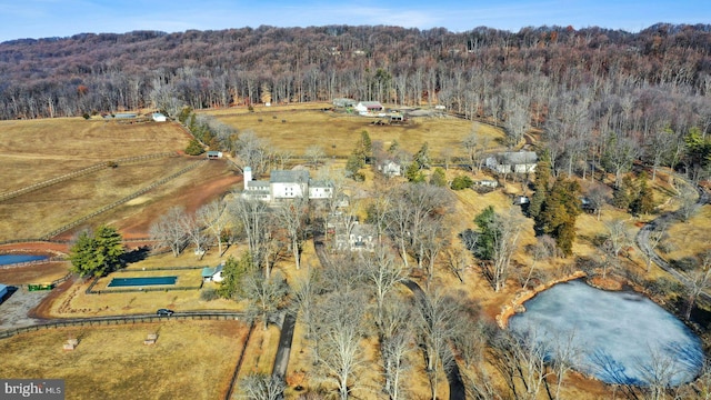 bird's eye view featuring a rural view and a water view