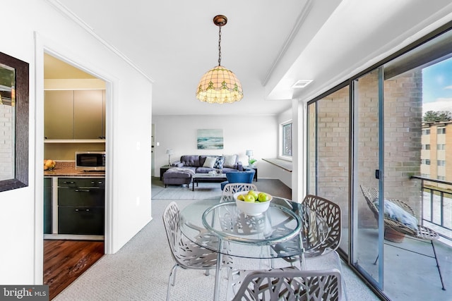 dining room with crown molding