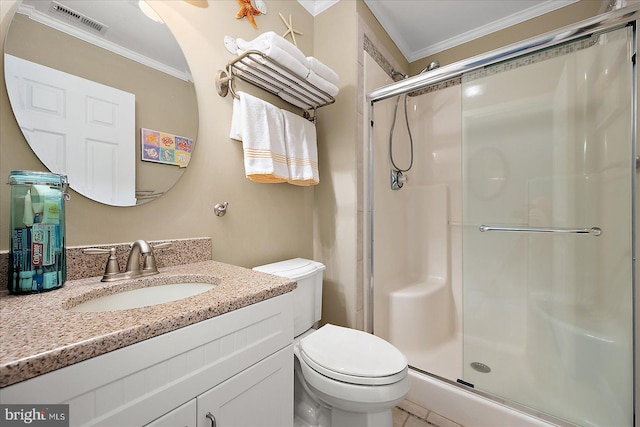 bathroom with toilet, ornamental molding, and a shower stall