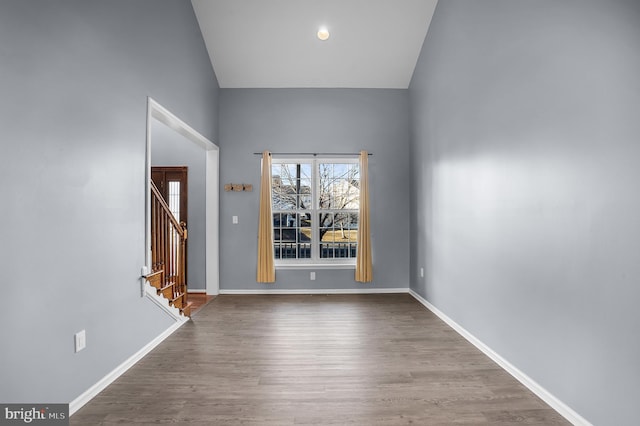 spare room featuring wood-type flooring