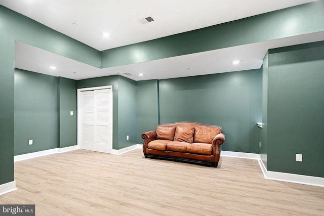 sitting room featuring recessed lighting, visible vents, baseboards, and wood finished floors