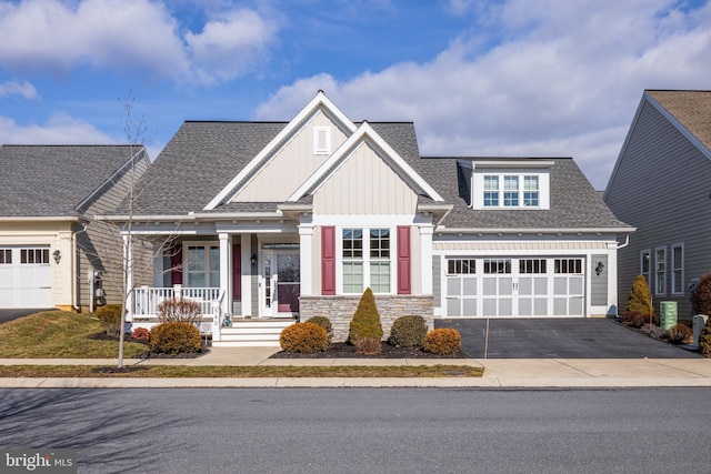 craftsman-style home with covered porch