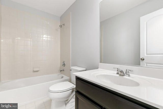 full bathroom featuring tile patterned floors, vanity, toilet, and shower / bathtub combination