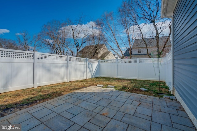 view of patio with a fenced backyard