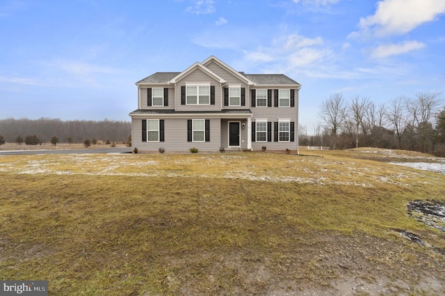 view of front facade with a front yard