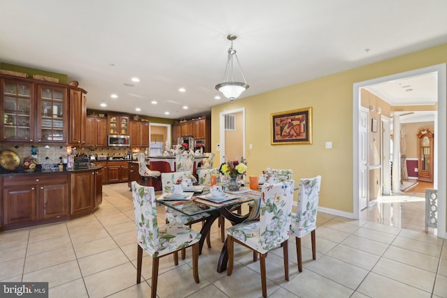 dining space with light tile patterned flooring