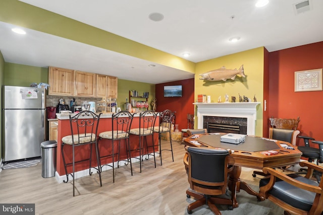 dining area with light wood-type flooring