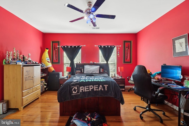 bedroom featuring ceiling fan and wood-type flooring