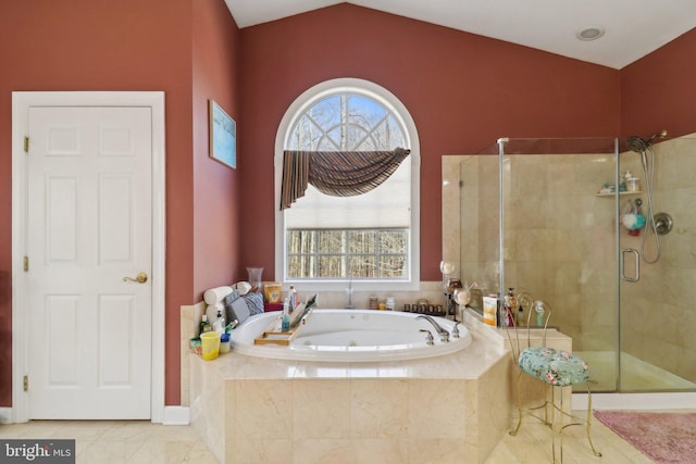 bathroom featuring tile patterned floors, lofted ceiling, and plus walk in shower