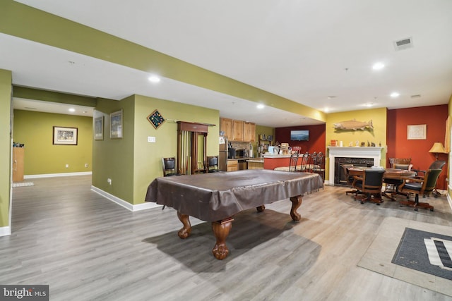 recreation room featuring light wood-type flooring and billiards