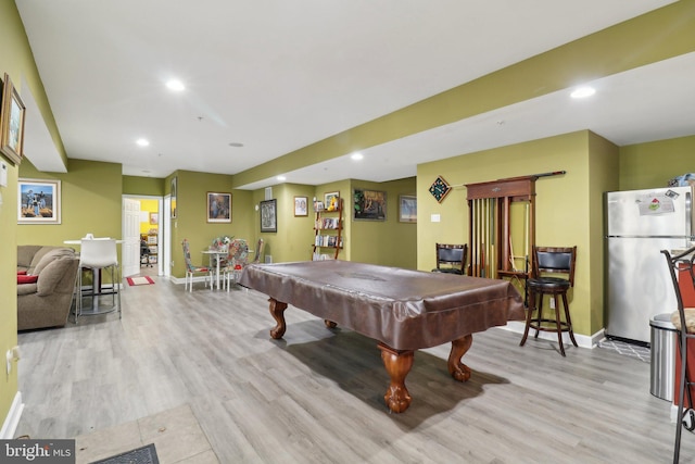 recreation room with light wood-type flooring and billiards