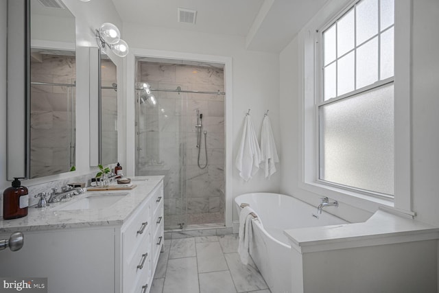 full bath featuring vanity, visible vents, a freestanding bath, marble finish floor, and a stall shower