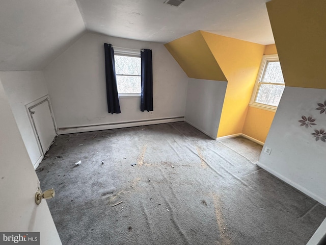 bonus room featuring a baseboard radiator, lofted ceiling, and light colored carpet