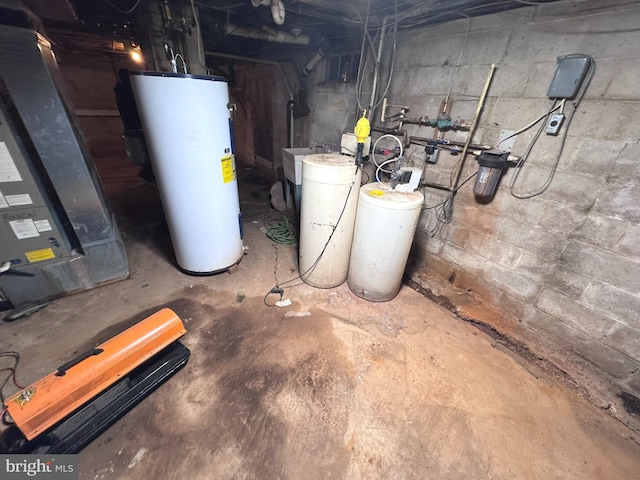 utility room featuring water heater