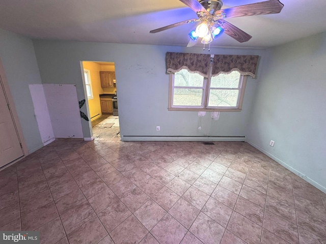 empty room featuring a baseboard heating unit and ceiling fan