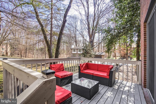 wooden deck featuring an outdoor hangout area