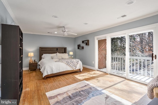 bedroom featuring access to exterior, crown molding, wood-type flooring, and ceiling fan