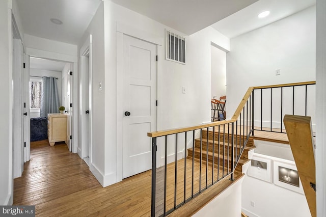 hallway featuring light wood-type flooring