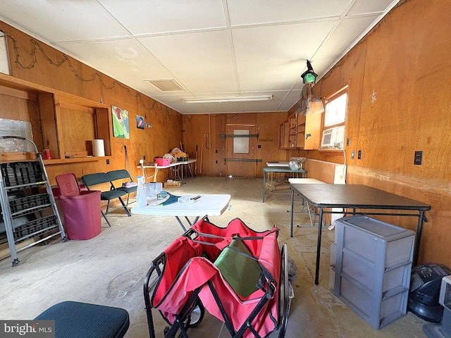 interior space featuring wood walls