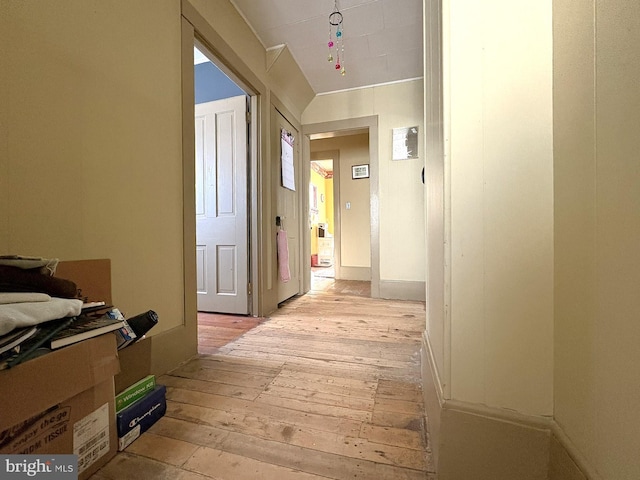 corridor featuring light hardwood / wood-style floors