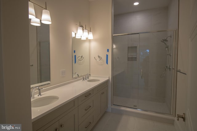 bathroom with vanity and walk in shower