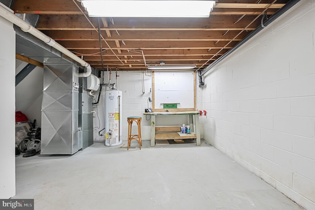 basement with water heater and heating unit