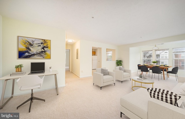 living room with light colored carpet