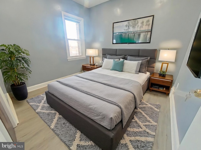 bedroom featuring hardwood / wood-style floors