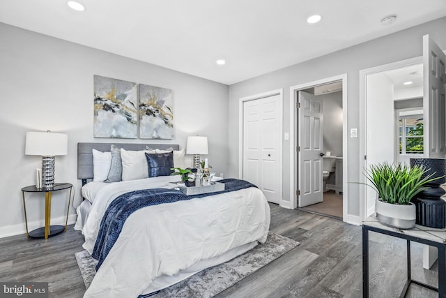 bedroom featuring dark wood-type flooring