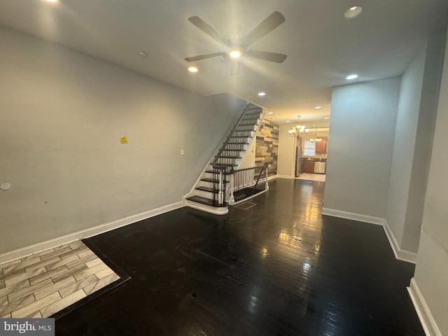 interior space with hardwood / wood-style flooring and a chandelier