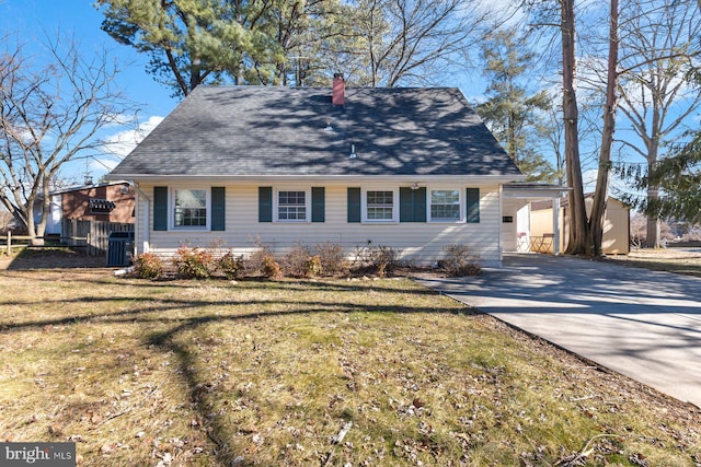 view of side of property with a yard