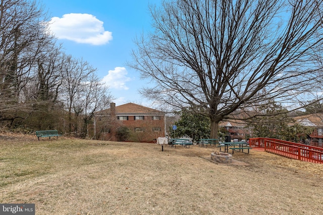 view of yard featuring a fire pit